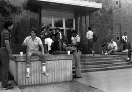Students gather near the Stewart Hall (1948) front entrance, St. Cloud State University