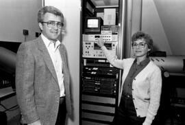 Marilyn Moser and Harlan Jensen with photo technology equipment, St. Cloud State University