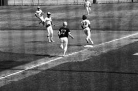 Dan Meyer touches first base during a St. Cloud State University baseball game against the University of Minnesota-Duluth