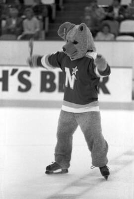 Husky mascot at a Minnesota North Stars' hockey game at Met Center, St. Cloud State University