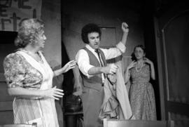 Carmen Zapata and Frank Caltabiano perform in the theatre production "A Little Holy Water," St. Cloud State University