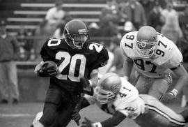 Football player Randy Martin runs with the football, St. Cloud State University