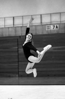 Gymnast Yvonne Fourneia competes in a meet against Mankato State College, St. Cloud State University