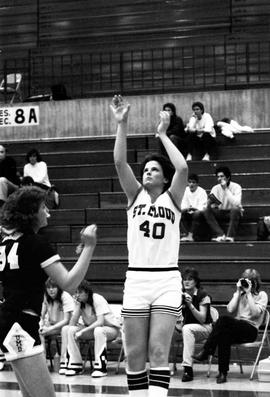 Bonnie Henrickson shoots the basketball against the University of Minnesota-Duluth, St. Cloud State University