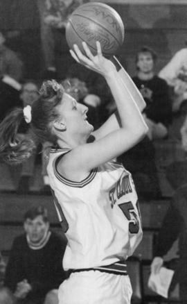 Brenda Meyer gets ready to shoot a basketball, St. Cloud State University