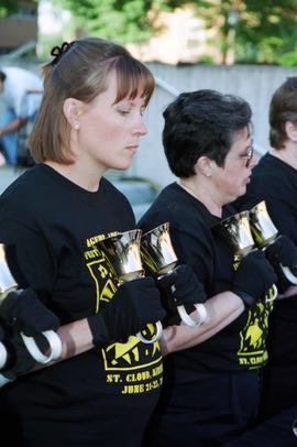 Women play in a bell choir, Lemonade Concert and Art Fair, St. Cloud State University