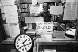A man broadcasts at KVSC studios, St. Cloud State University