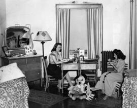 Two students relax in their dormitory room, St. Cloud State University