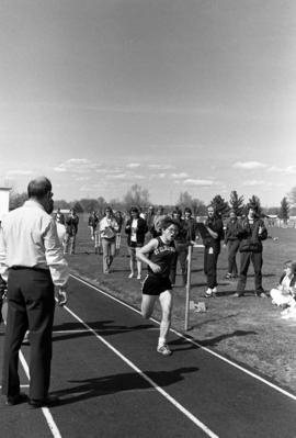 Dee Griebel finishes a race during a track meet, St. Cloud State University