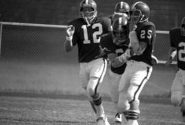 St. Cloud State football Keith Nord (#12) and others run together during a football against Moorhead State University