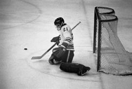 St. Cloud State hockey player Rory Eidsness makes a stop against Hamline University