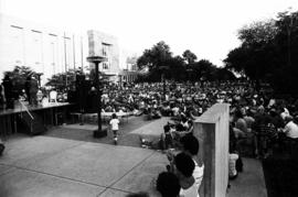 A crowd gathers in front of a stage to watch the entertainment, Lemonade Concert and Art Fair, St. Cloud State University