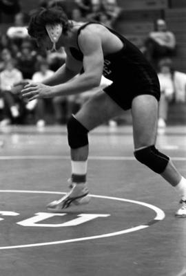 Phil Herbold during a wrestling match, St. Cloud State University