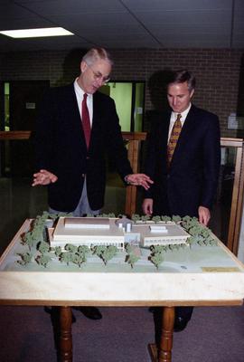 "St. Cloud University President Bruce Grube, left, and Minn. Rep. Joe Opatz, SCSU special assistant to the president, examine a model of the proposed new library"