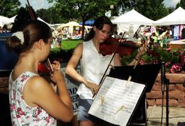 Two women play violins together, Lemonade Concert and Art Fair, St. Cloud State University