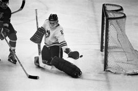 St. Cloud State hockey player Rory Eidsness makes a stop against Hamline University