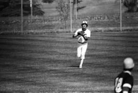 Jim Eisenreich catches a baseball during a St. Cloud State University baseball game