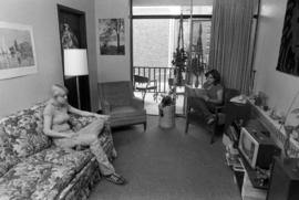 Two women sit in a living room, St. Cloud State University