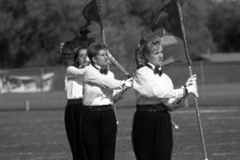 Marching band performs at a football game, St. Cloud State University