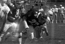 Mike Lambrecht runs during a football game against Southwest State University, St. Cloud State University