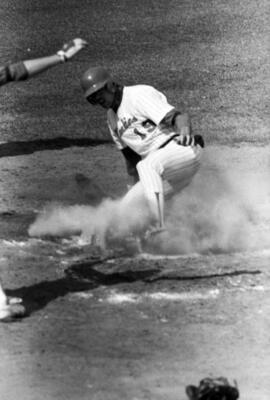 Larry Goodrie slides into home plate during a St. Cloud State University baseball game