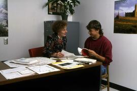 Librarian Susan Hubbs Motin helps a student, St. Cloud State University