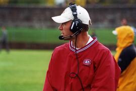 Randy Hedberg coaches during a football game, St. Cloud State University