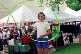 A girl swings around fabric, Lemonade Concert and Art Fair, St. Cloud State University