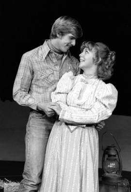 Tim Leach as Curley and Sharon Hentages as Laurey in the theatre production of "Oklahoma!," St. Cloud State University