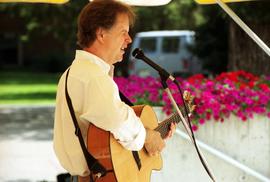 Man plays a guitar, Lemonade Concert and Art Fair, St. Cloud State University