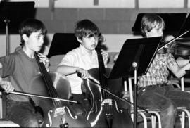 Children play musical instruments during a concert, St. Cloud State University