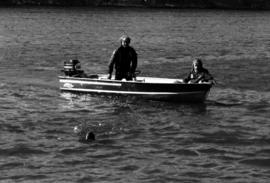 Bryant Beehler swims across the Mississippi River, St. Cloud State University