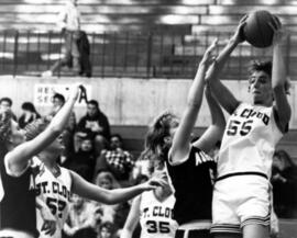 Simona Samuelson looks to pass the basketball, St. Cloud State University