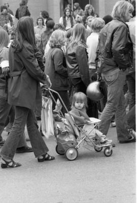 A woman marches, Day of Peace protest, St. Cloud State University