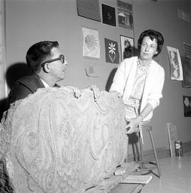 Algalee Adams and Roger Schwitalla with his "Odin" sculpture, St. Cloud