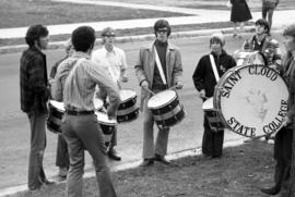 Students practice playing drums at band practice, St. Cloud State University