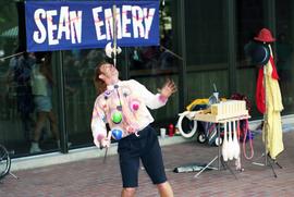 A man juggles items, Lemonade Concert and Art Fair, St. Cloud State University