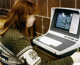 Woman uses a computer at Centennial Hall (1971), St. Cloud State University