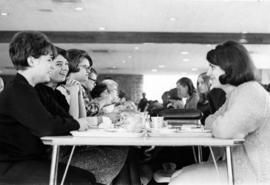 Students sit together in Garvey Commons (1963), St. Cloud State University