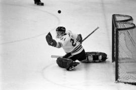 St. Cloud State hockey player Rory Eidsness makes a stop against Bemidji State University