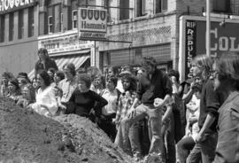 People listen to a speech, Day of Peace protest, St. Cloud State University