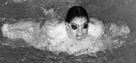 St. Cloud State University men's swimmer Bob Quinlan competes against the University of Wisconsin-Eau Claire