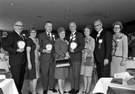 Distinguished Alumni award winners Schuyler Joyner, Chester Heinzel, and Ralph Heimdahl with President Robert Wick and their wives, St. Cloud State University