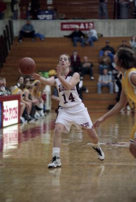 St. Cloud State basketball player Celest Frank passes a ball during a game