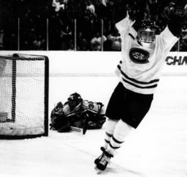 St. Cloud State University hockey player Jason Goulet scores a goal in a game against the University of Minnesota