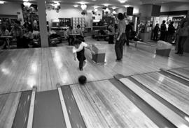 Students bowl at Atwood Memorial Center (1966) during a Mardi Gras party, St. Cloud State University