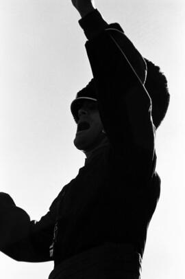 Drum major performs at a football game, St. Cloud State University