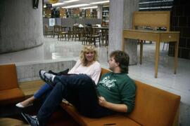 Students sit in a sunken lounge at Centennial Hall (1971), St. Cloud State University