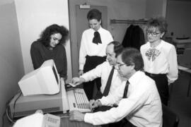 Stephen Frank and John Murphy work with students on the St. Cloud State University survey