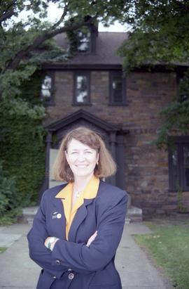 Addie Turkowski in front of Carol House (1936), St. Cloud State University